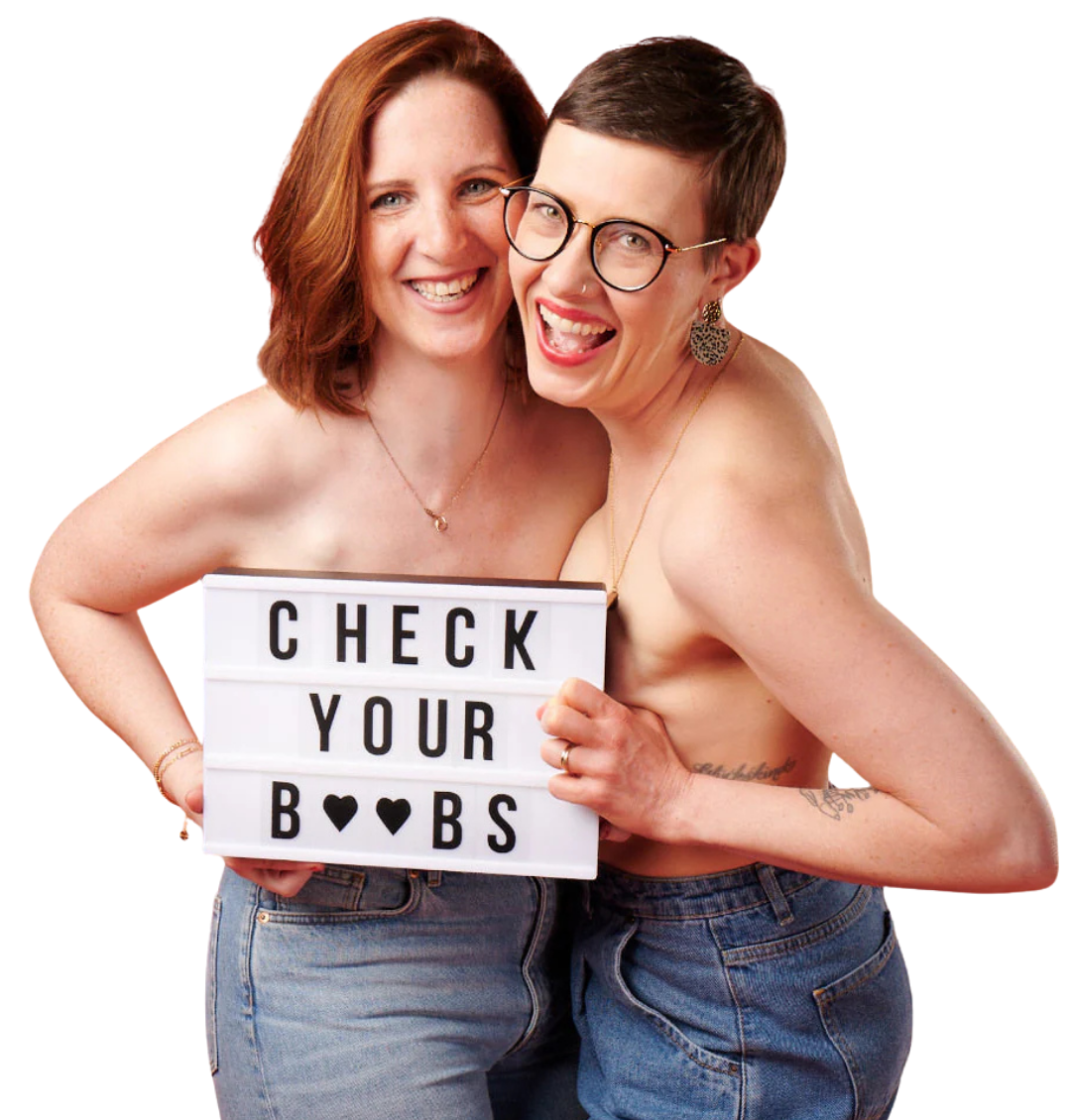 Foto von Anne und Claudi mit einem Schild „CHECK YOUR BUUBS"
